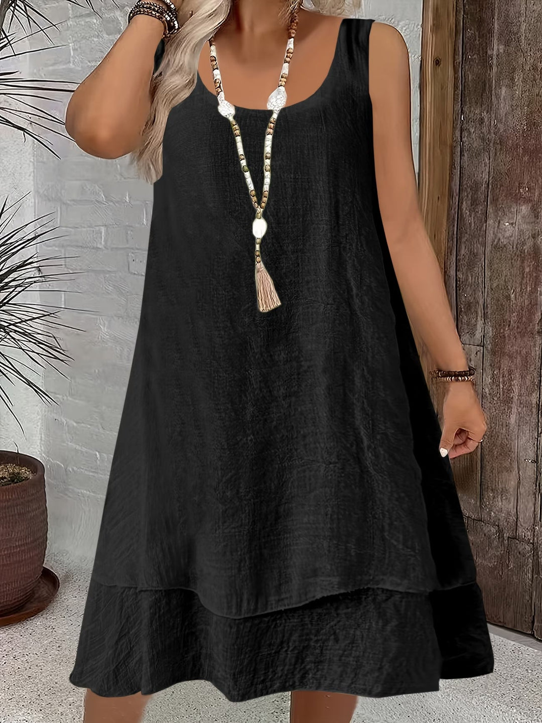 Everyday women's casual loose sleeveless dress. Comfortable & chic for relaxed spring and summer fashion.