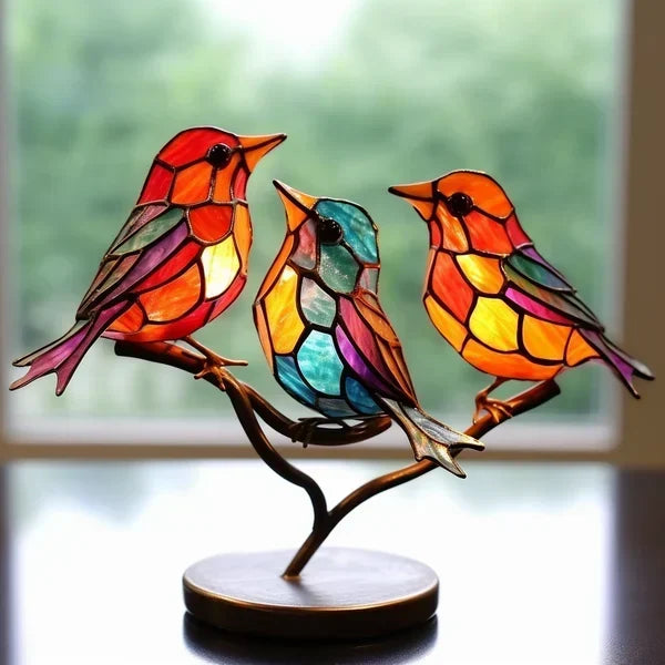 Serene modern bird art, elegant tabletop sculpture with beautiful coloured glass, a living room accent.