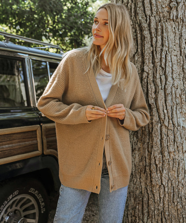 Versatile women's elegant knit cardigan, a timeless piece for fall and winter fashion layering.