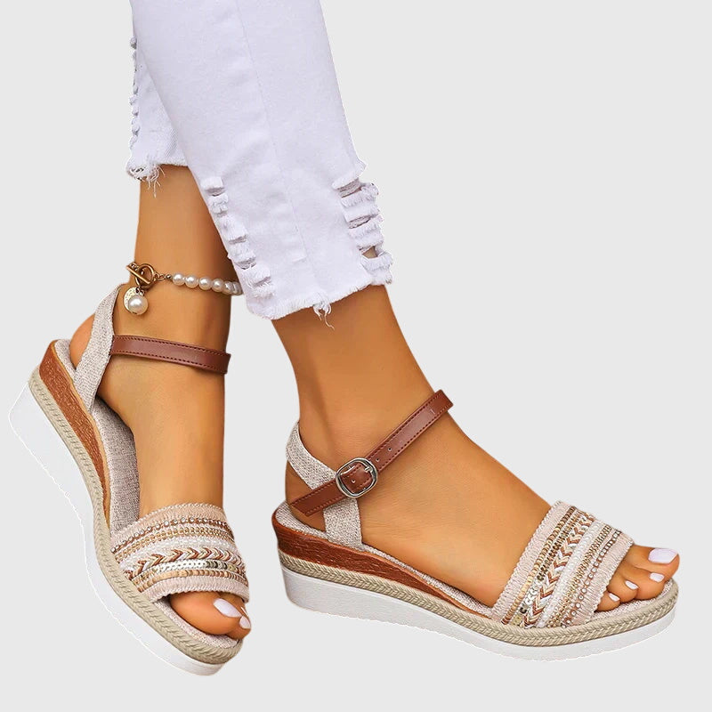 White & brown boho style women's sandals. Comfortable summer footwear with orthopedic arch support.