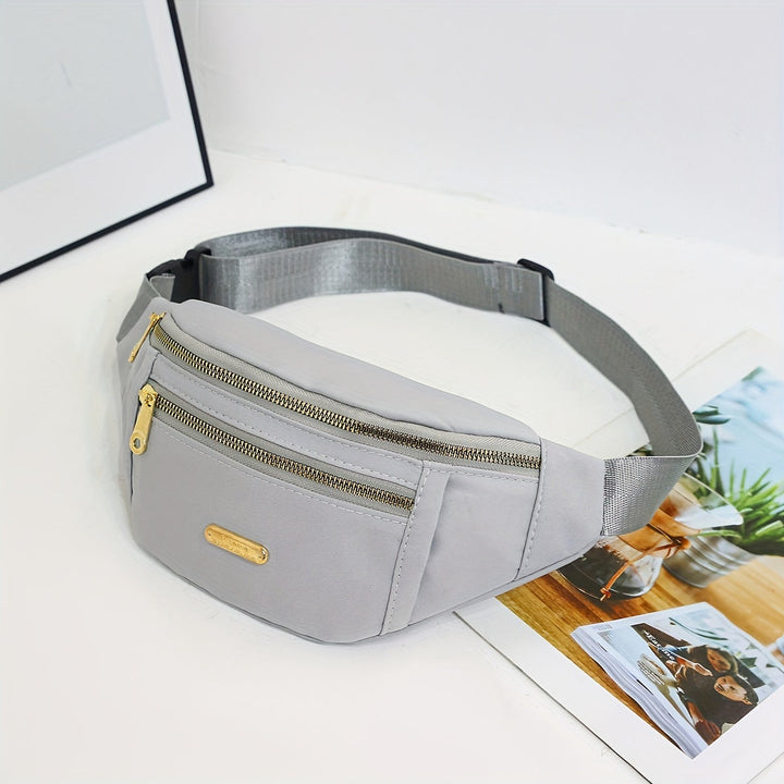Practical women's lightweight shoulder bag, adjustable strap, multi-zip pockets, hands-free carrying.