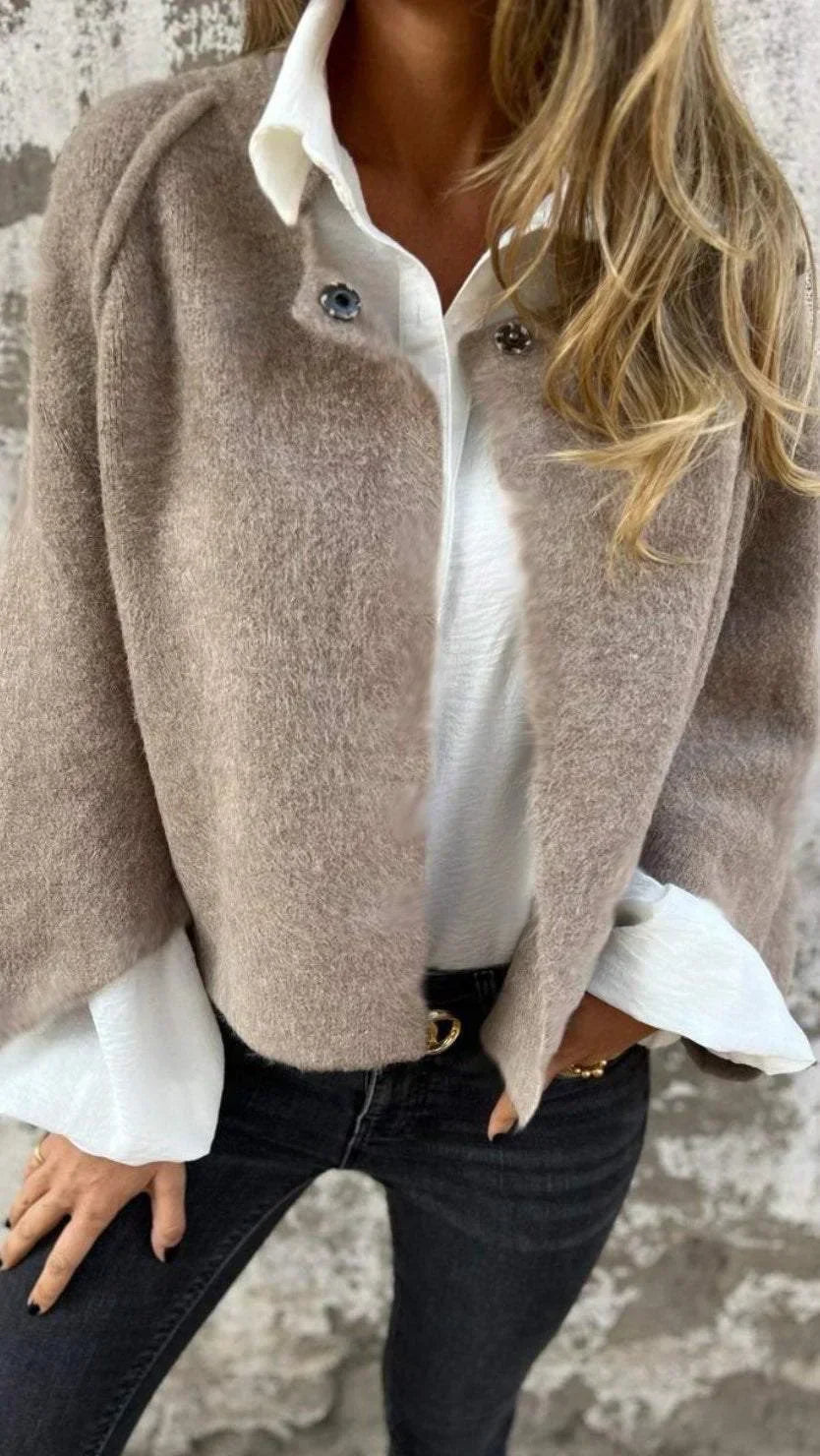 Elegant women's classic spring coat, tailored fit for sophisticated layering. Chic outerwear for versatile fashion.