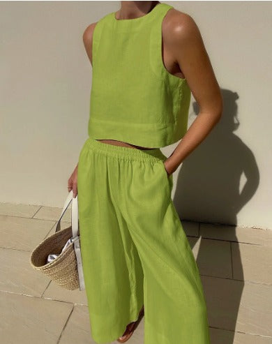 Chic women's wide-leg linen blend pants & matching crop top, creating a breathable summer two-piece set.