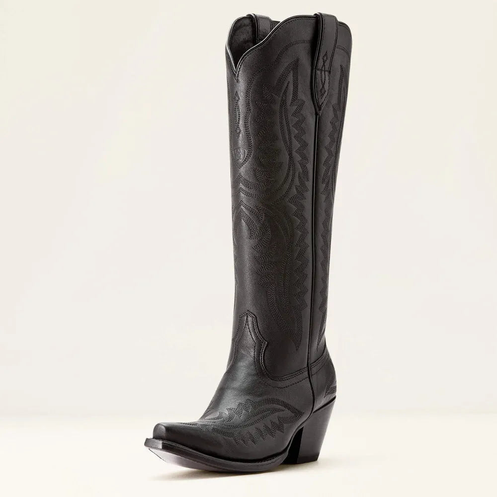 Modern women's patterned zipped tall boots, featuring a contemporary pointed toe & fashion-forward design.