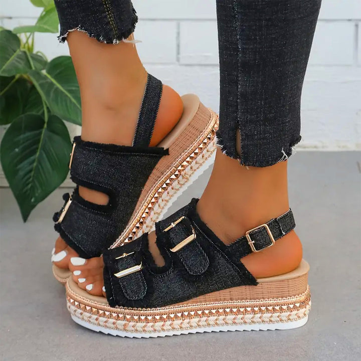 Denim platform wedge sandals for women, featuring a casual design, ideal for comfortable summer footwear fashion.