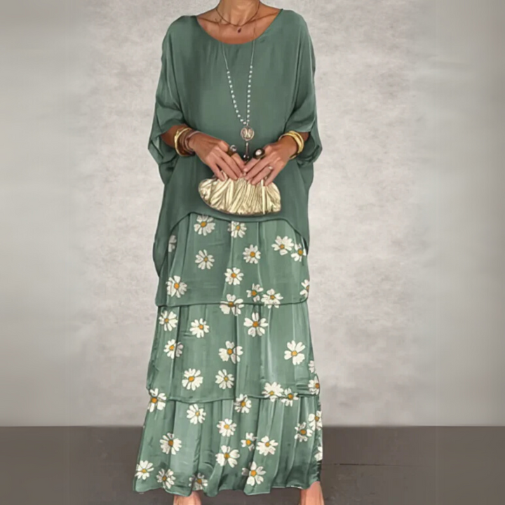 Flowy printed long sleeve maxi dress for women, featuring elegant tiered design, perfect for casual wear.