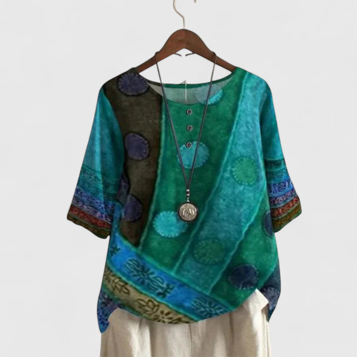 Ladies' elegant boho patchwork print top, a stylish and comfortable piece for fall and spring fashion looks.