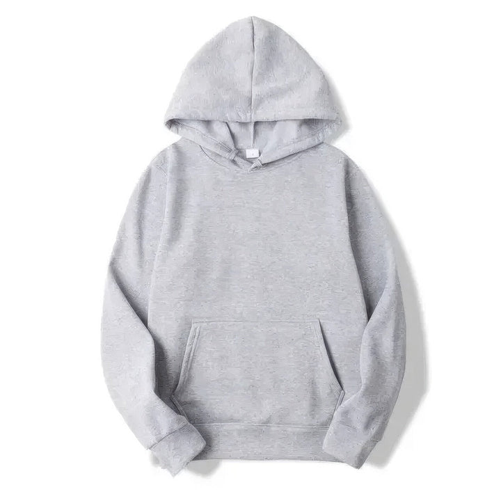 Close-up of a warm unisex hoodie, showing soft fabric and relaxed cut. Ideal for winter everyday comfort.