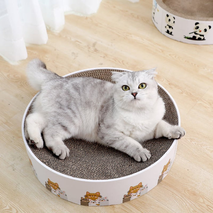Round cat scratching mat made of cardboard for claw care and furniture protection.