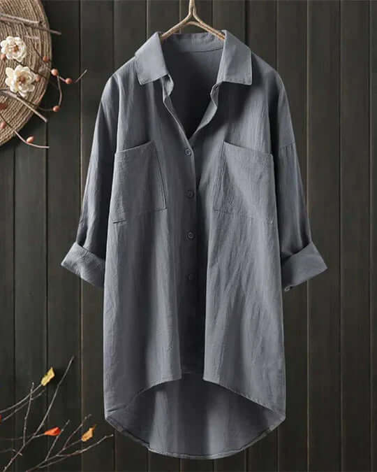 Light & airy women's white flowy blouse. Long-sleeve, loose fit for comfortable summer casual wear & everyday elegance.