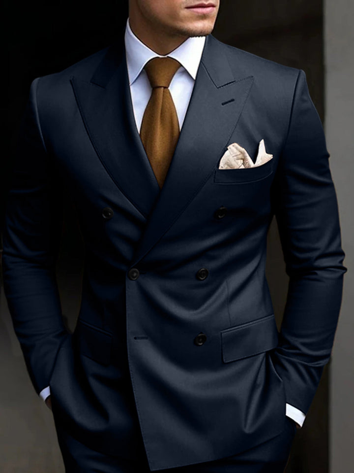 Close-up of a tailored double-breasted men's suit jacket, showing details.