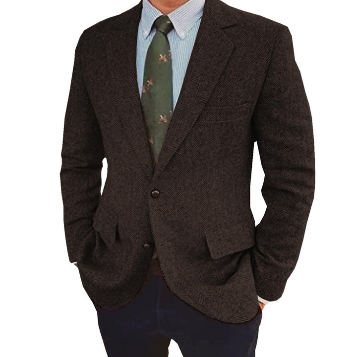 Close-up of a men's brown two-button retro tailored jacket, showcasing fabric and button details.