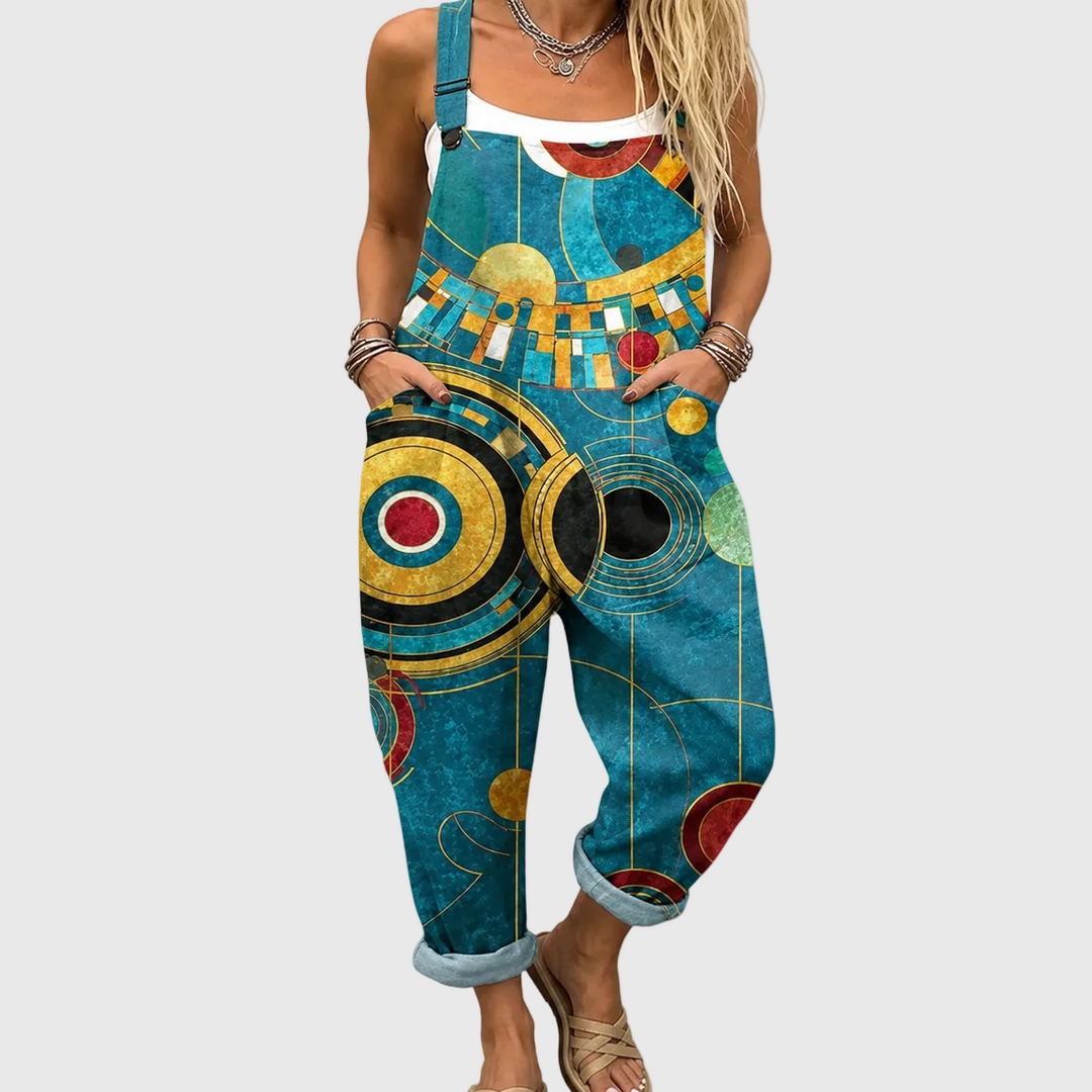 Women's elegant Art Deco style jumpsuit with geometric print, relaxed fit. Chic, versatile for summer.