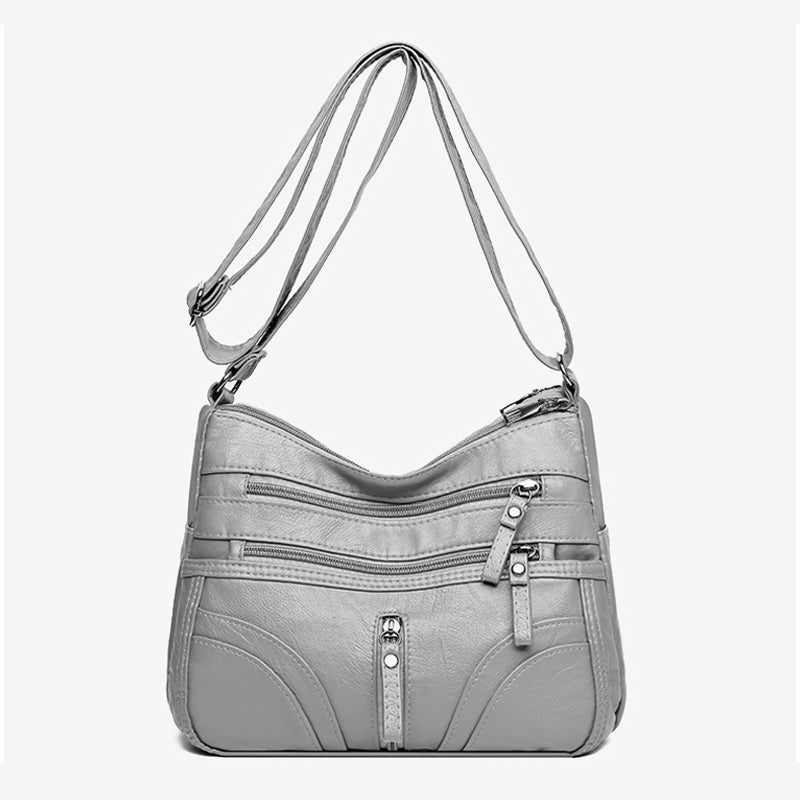 Relaxed fit women's crossbody bag, vintage faux leather for versatile everyday wear.