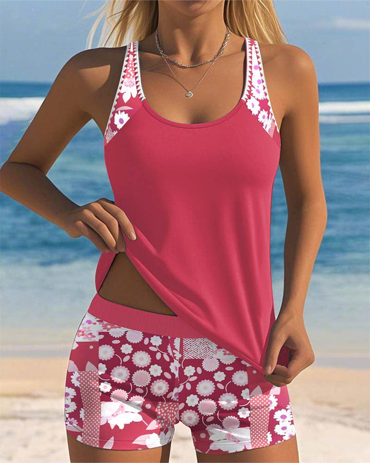 Printed women's two-piece swimsuit set. Trendy tankini and shorts, perfect for resort wear.