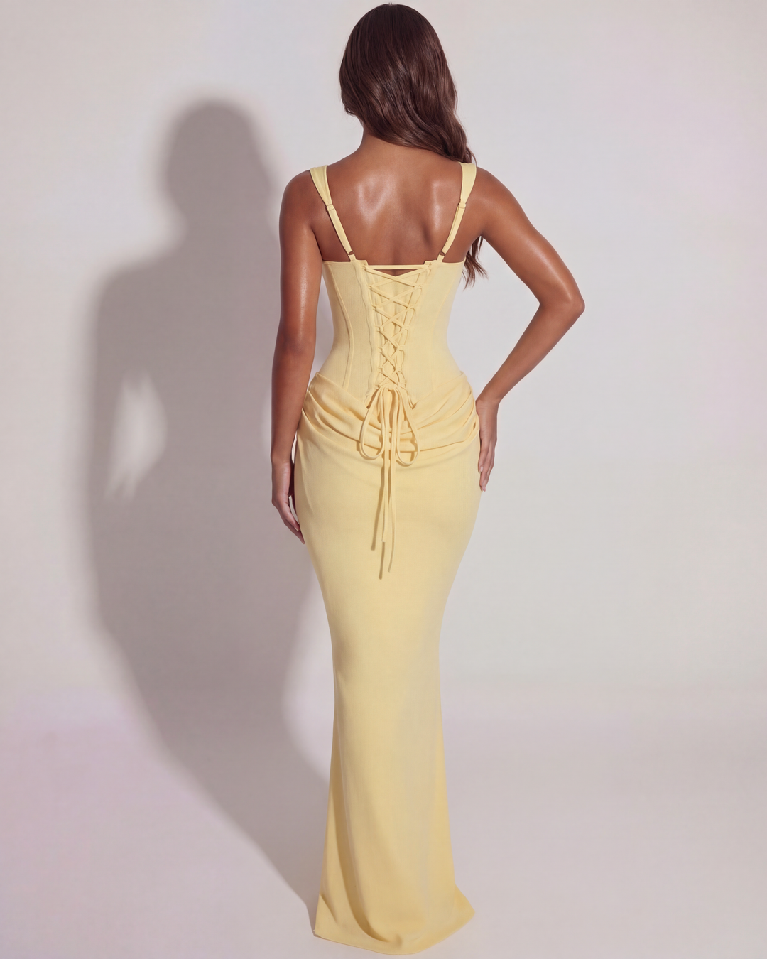 Sophisticated women's yellow maxi dress, flattering sculpted bodice & long flowing silhouette.