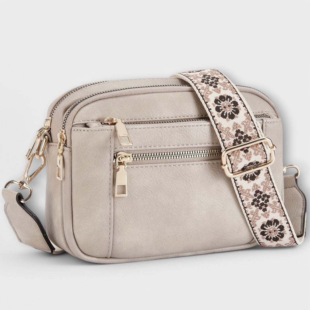 Fashionable retro women's shoulder bag, tan vegan leather, featuring a unique boho adjustable strap.