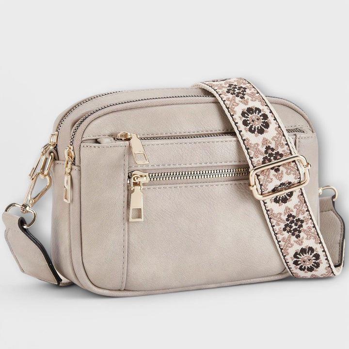 Fashionable retro women's shoulder bag, tan vegan leather, featuring a unique boho adjustable strap.