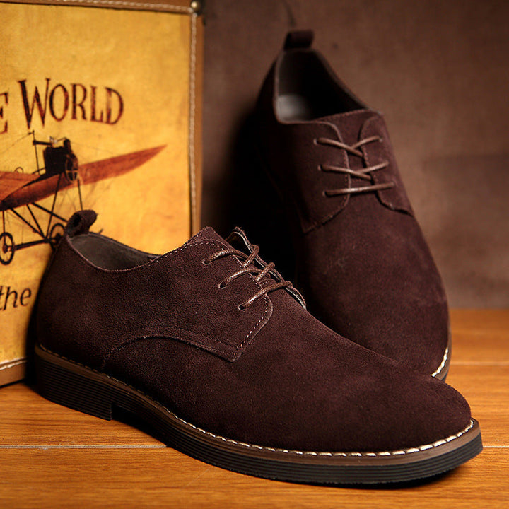 Classic black men's lace-up dress shoes for formal business attire. Sophisticated, comfortable, and elegant footwear.
