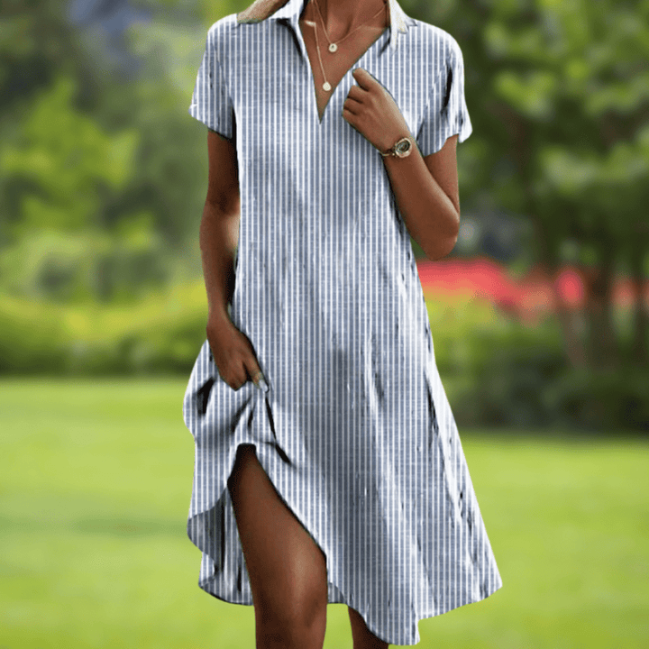 Women's Galiana V-Neck elegant floral print dress. A versatile and stylish option for any occasion.
