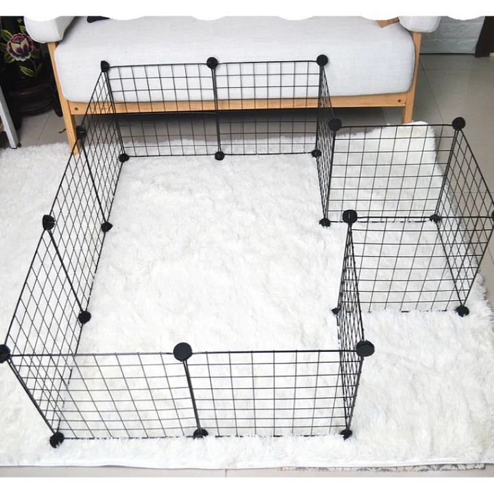 Secure flexible wire dog playpen with door, creating a safe pet enclosure for puppies & small pets.