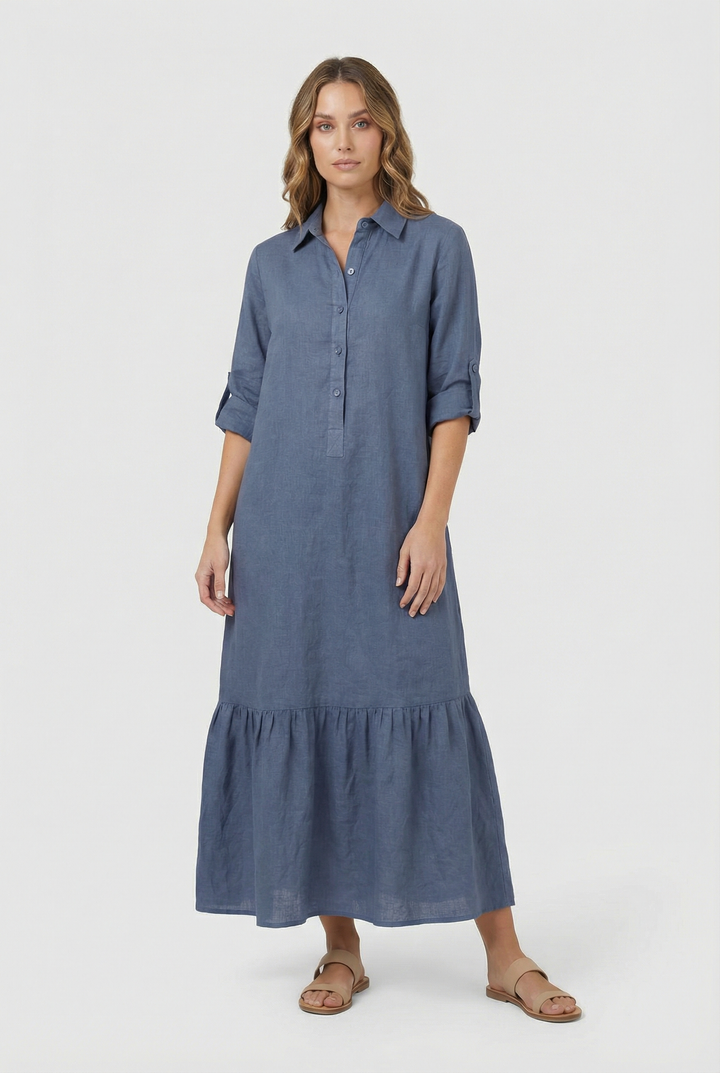 Elegant women's tiered maxi shirt dress with long sleeves and button-front. Relaxed fit, perfect for all seasons.
