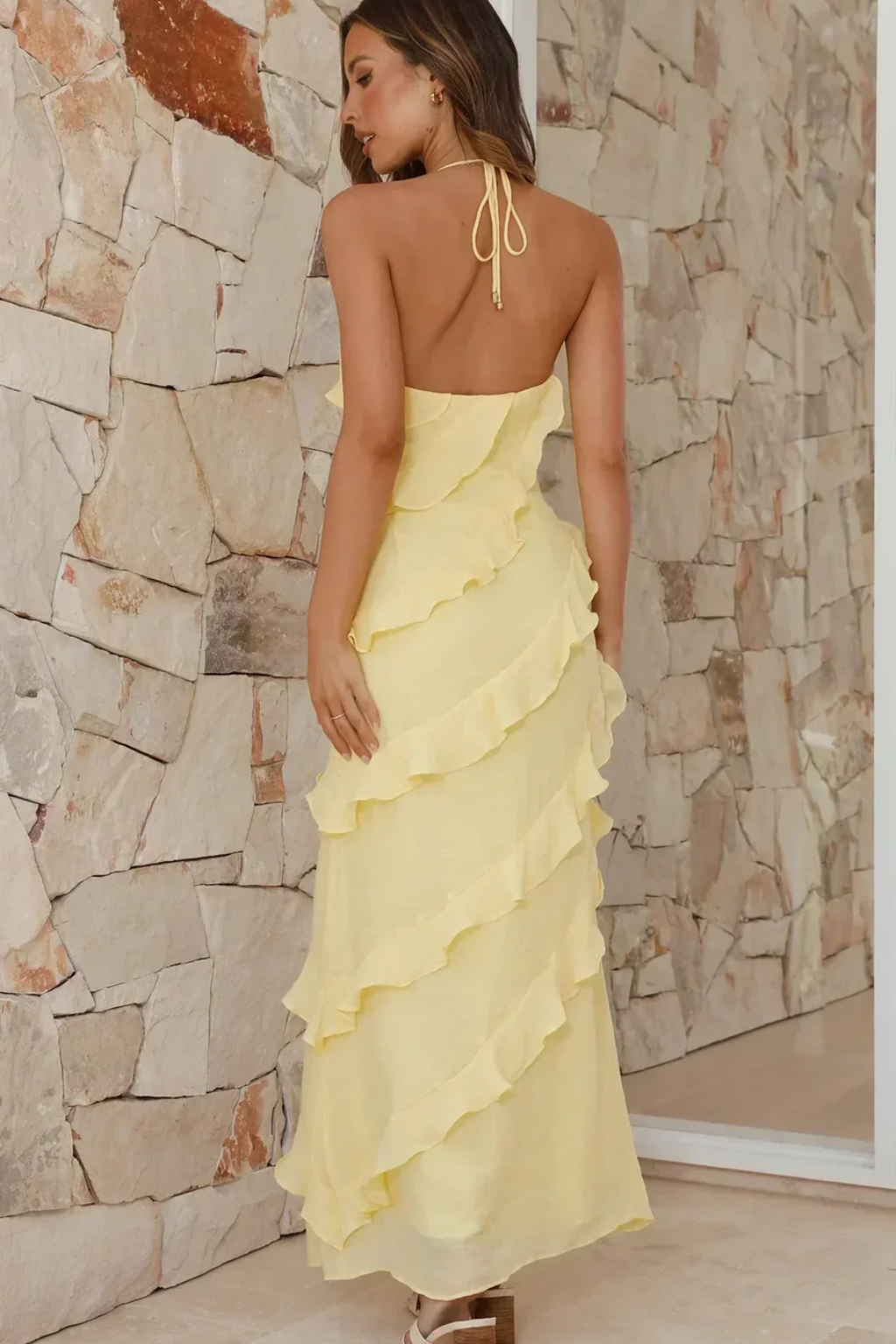 Stylish women's summer halter neck maxi dress with ruffled tiers, great for beach casual wear & elegance.