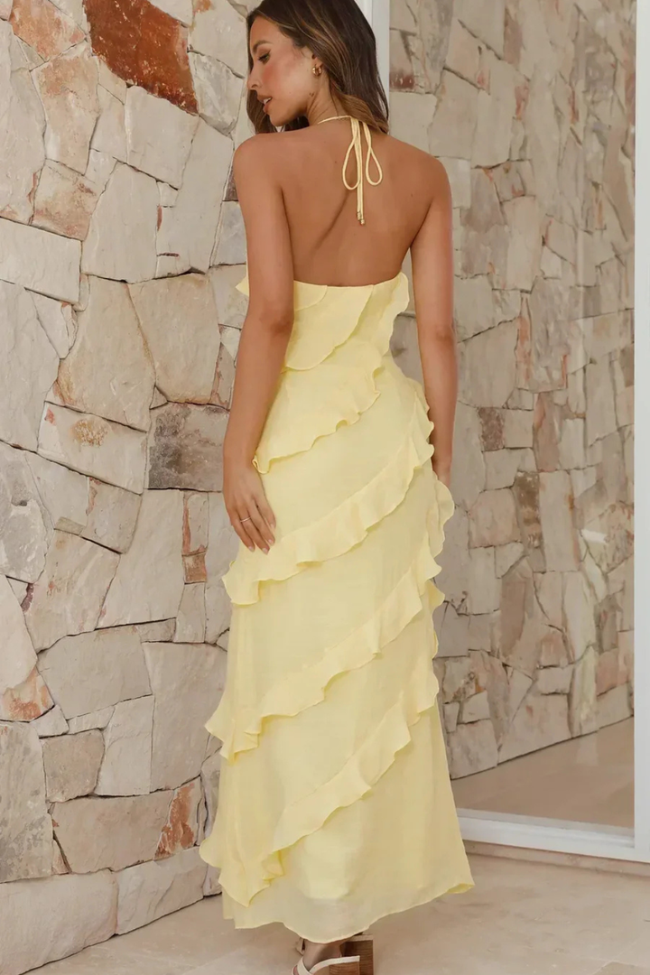 Stylish women's summer halter neck maxi dress with ruffled tiers, great for beach casual wear & elegance.