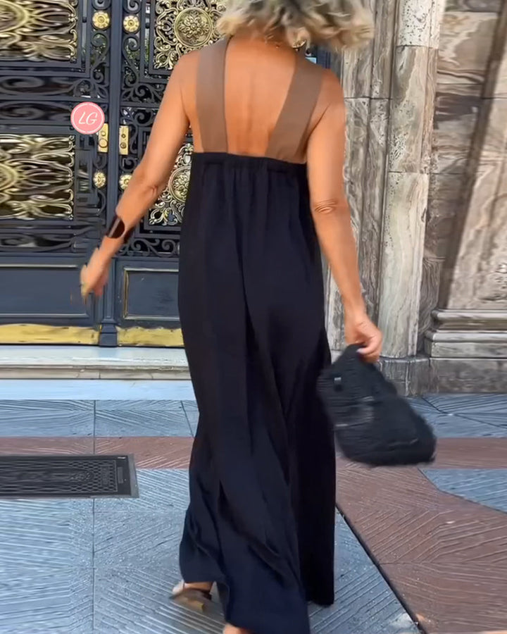 Sophisticated women's long dress with a unique cross neck. A chic, sleeveless maxi for formal events.