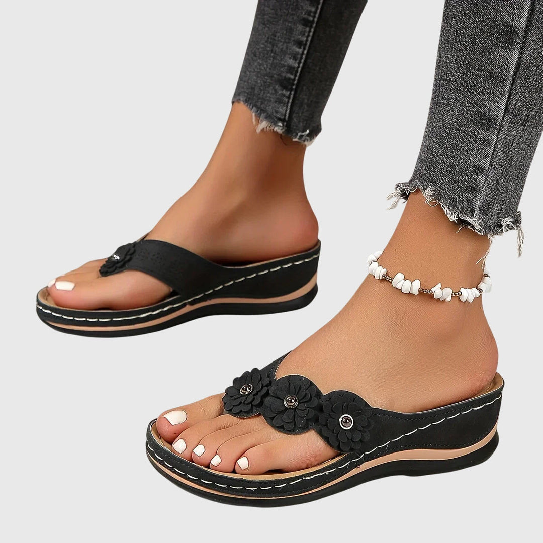 Casual women's flip flops designed with advanced arch support for ultimate comfort & stability.