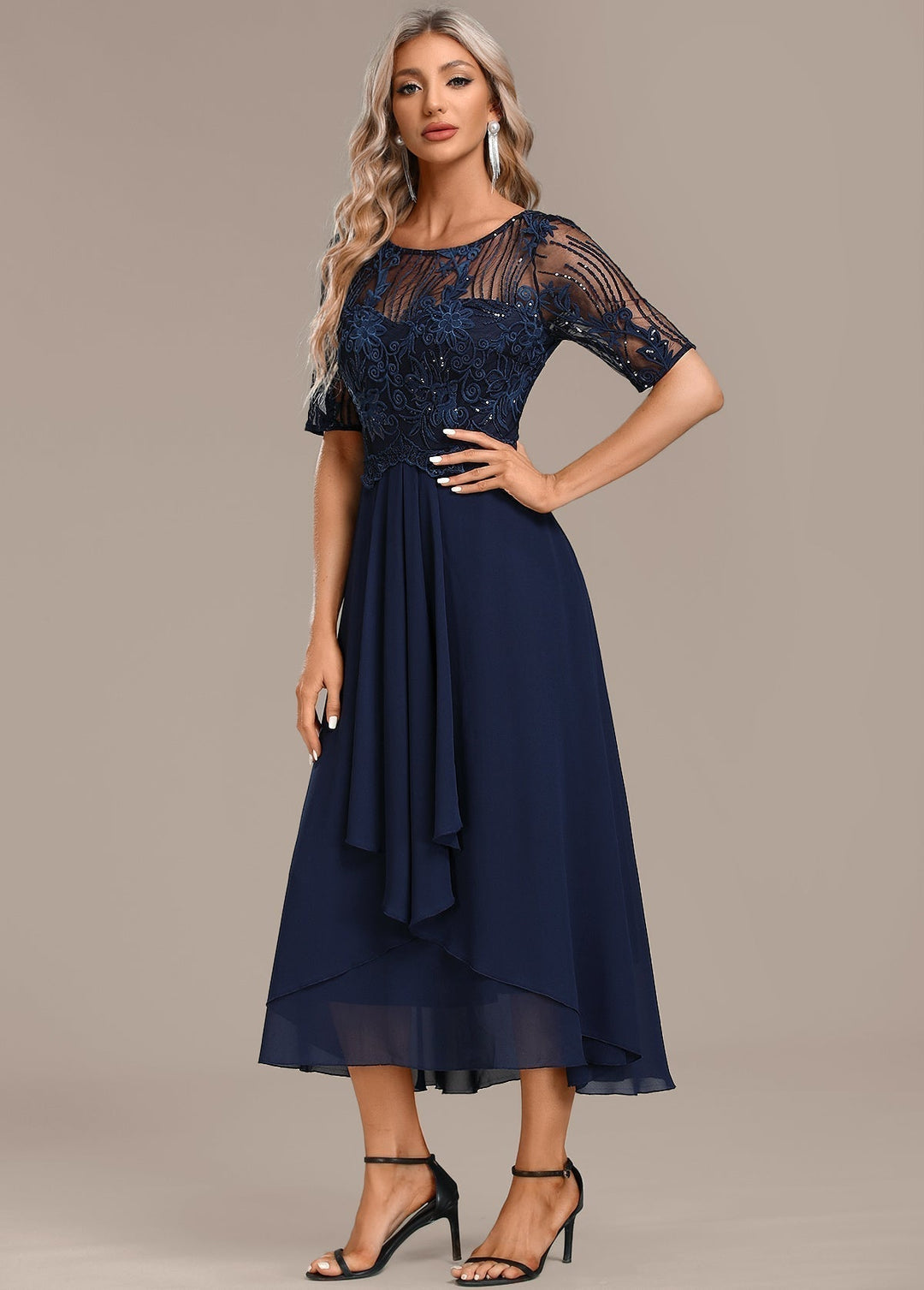 Sophisticated women's navy lace midi dress with a fitted bodice, great for formal events & special occasions.