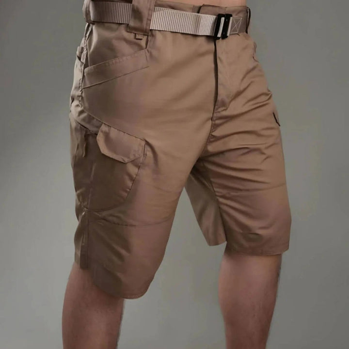 Men's khaki utility cargo shorts with multiple pockets, ideal for adventure & casual summer wear.