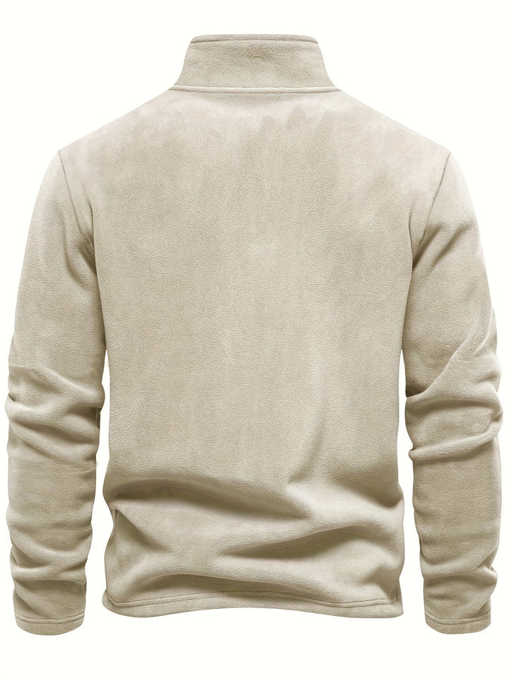Cozy unisex fleece half-zip pullover for ultimate warmth. A winter essential for everyday casual style.