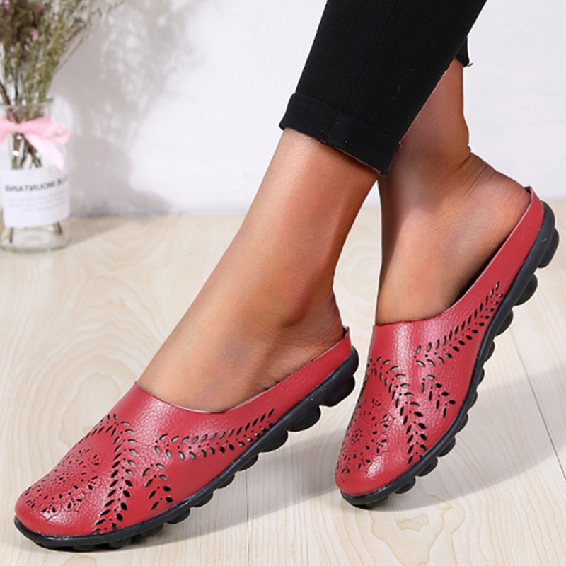 Textured women's orthopedic clogs, emphasizing breathable design and comfortable fit.