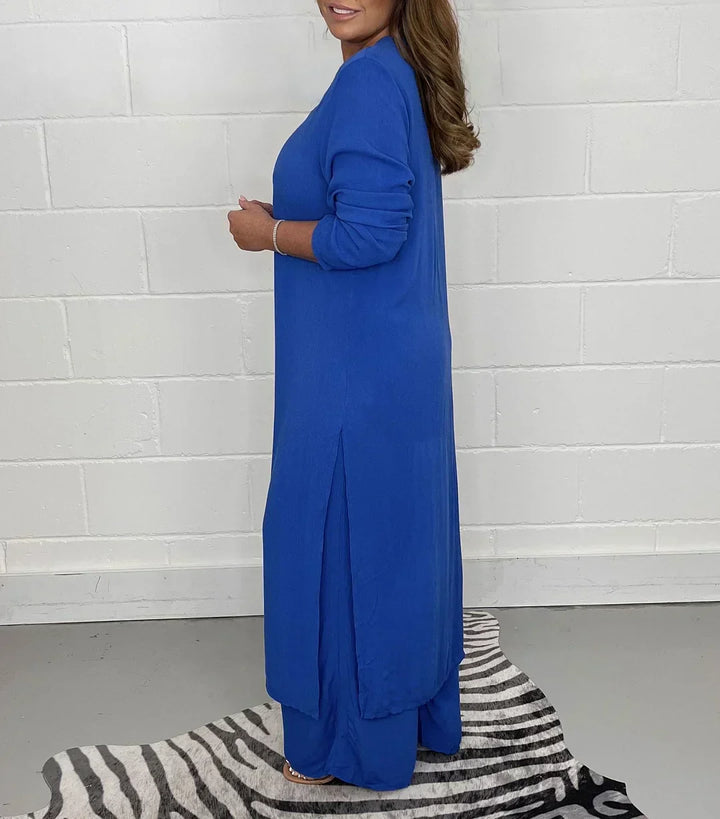Women's autumn fashion long sleeve V-neck top with slit and relaxed fit pants set. Casual & cozy outfit.