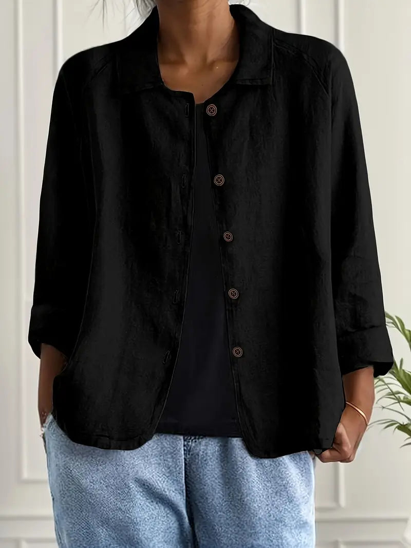 Fashionable women's button-down blouse, collared with 3/4 sleeves, offering a versatile everyday top.