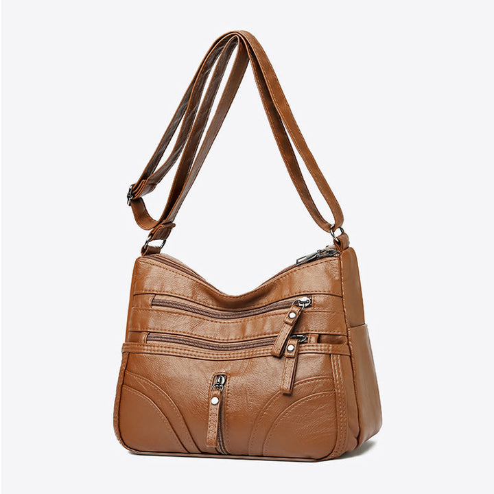 Versatile women's everyday shoulder bag, relaxed design with a vintage touch.