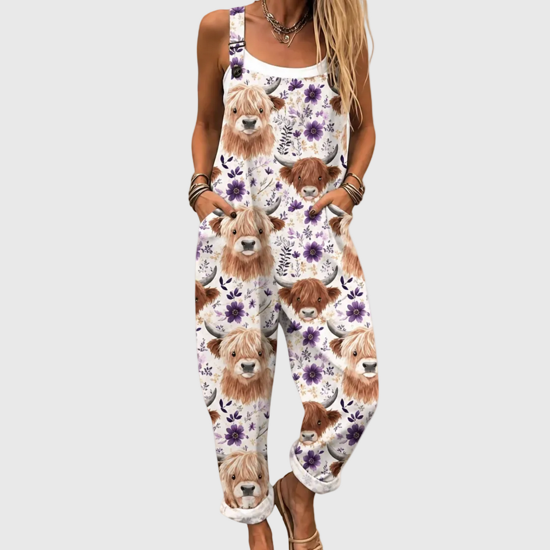 Women's cute Highland cow & purple floral print overalls. Casual summer jumpsuit with adjustable straps & pockets, relaxed fit.