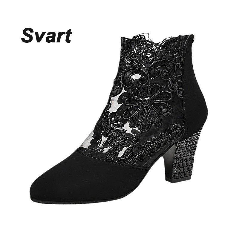 Chic women's fall/winter ankle boots with elegant lace embroidery and a comfortable block heel for any outfit.