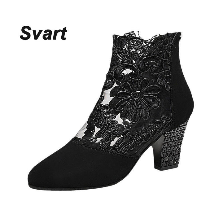 Chic women's fall/winter ankle boots with elegant lace embroidery and a comfortable block heel for any outfit.