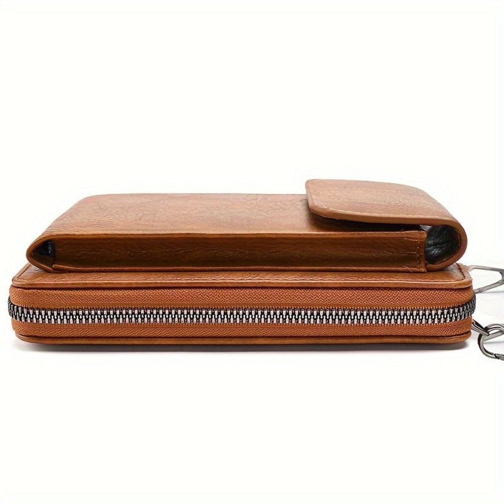 Chic minimalist women's leather crossbody bag, a versatile and elegant full-grain leather shoulder handbag with flap closure.