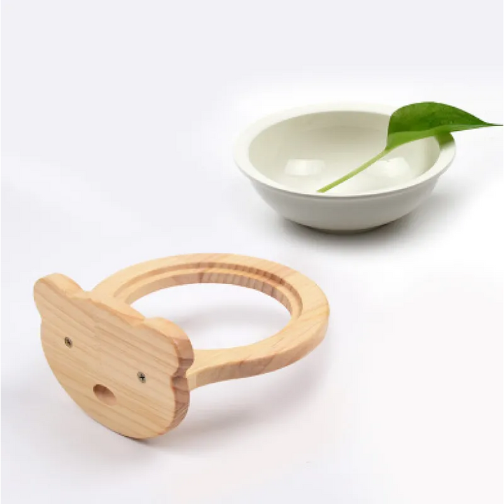 Modern wall-mounted cat bowl with unique cloud design wooden frame. Elevated feeder for comfortable pet dining.