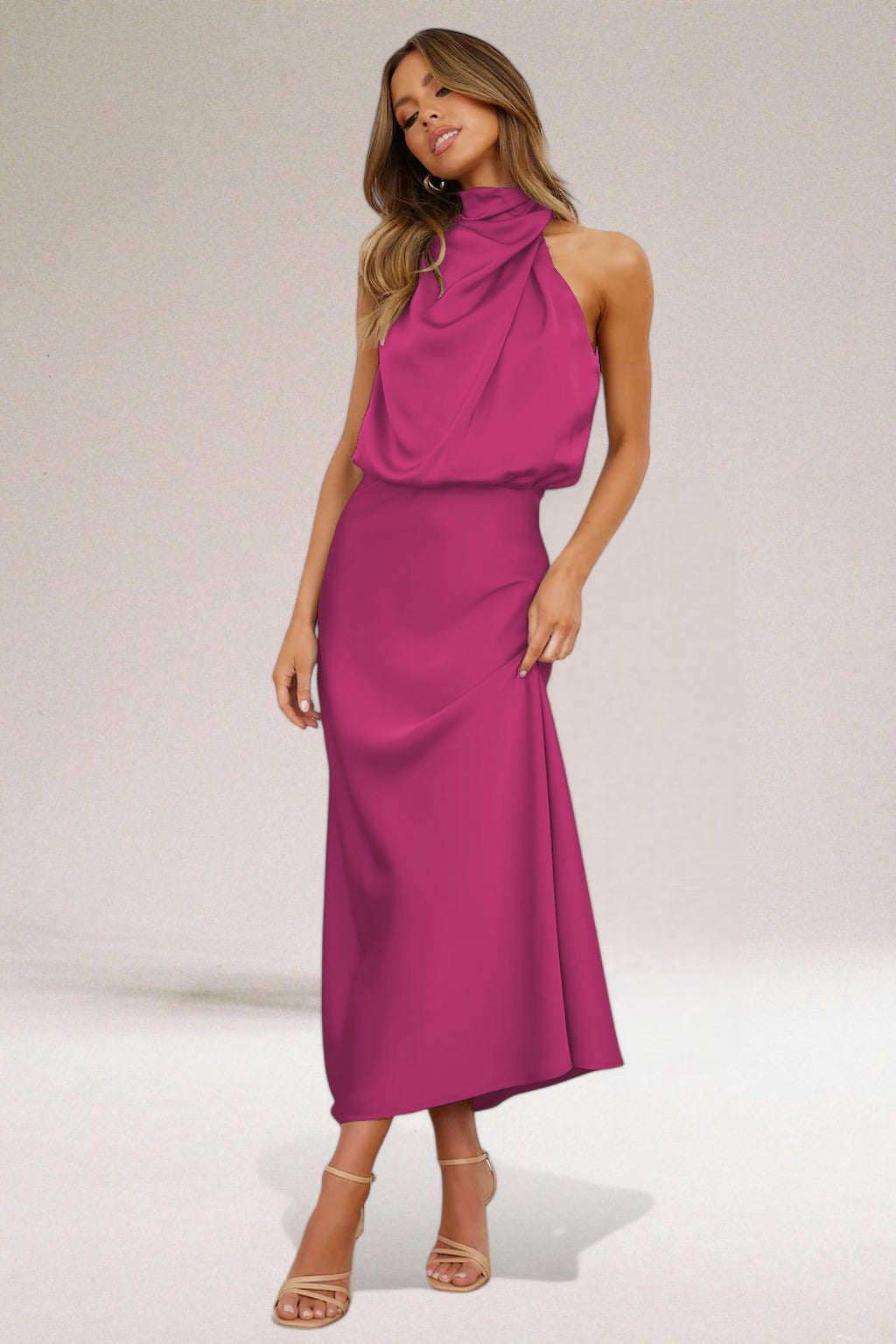 Sophisticated women's halter neck maxi evening gown, perfect for formal events & glamour.