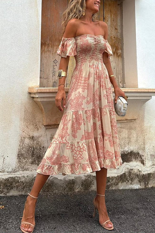 Romantic women's pink off-shoulder smocked tiered midi dress, ideal for holiday parties or elegant summer casual wear.