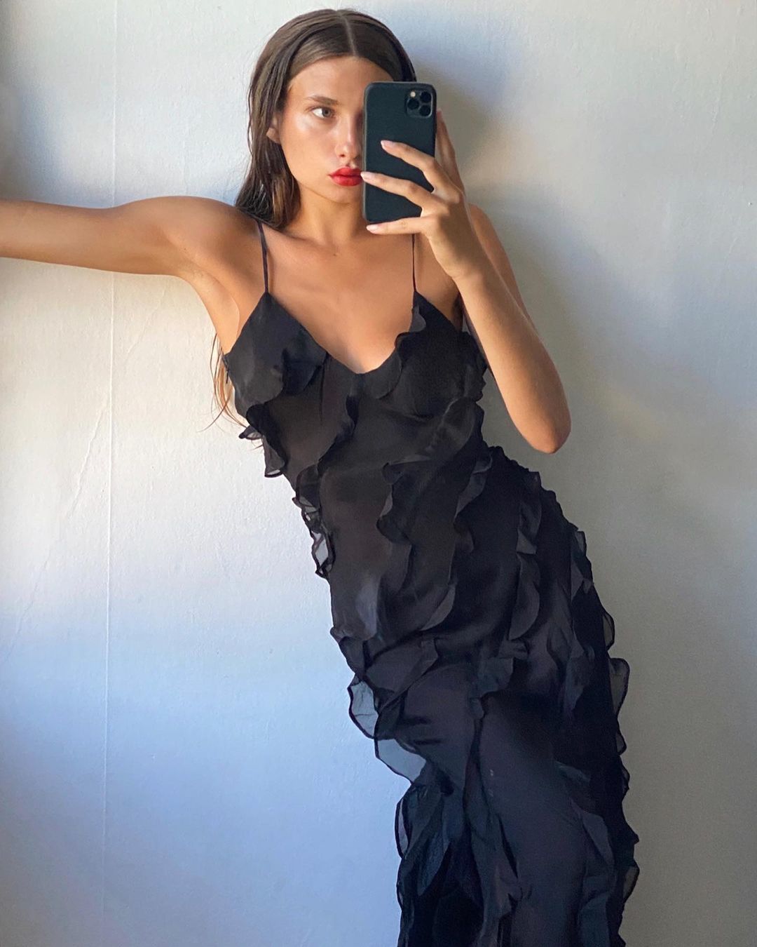 Women's elegant long ruffled dress, perfect for formal occasions and sophisticated parties.