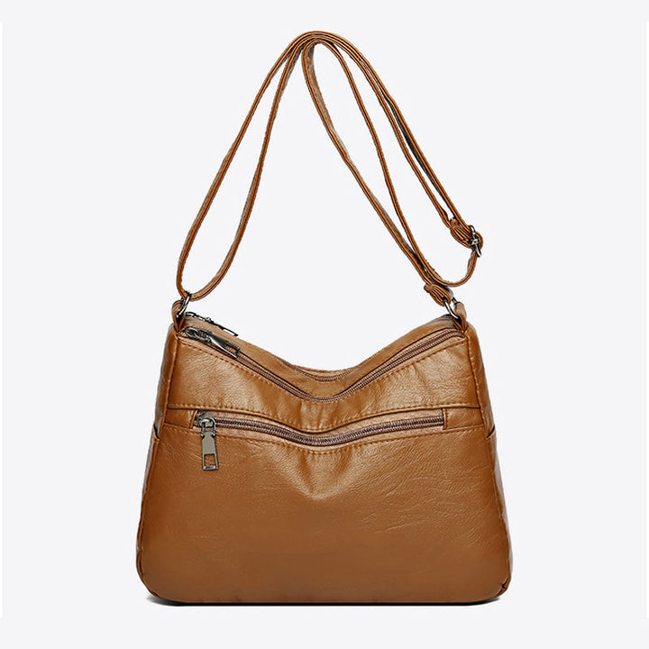 Casual vintage shoulder bag for women, faux leather, ideal for daily errands.