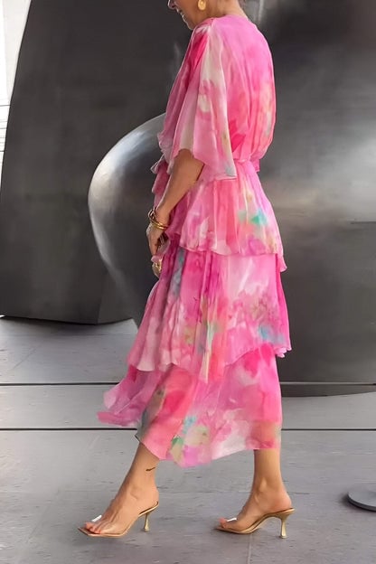 Gorgeous layered maxi dress for women, featuring a draped bohemian style. Excellent for a chic garden party look.