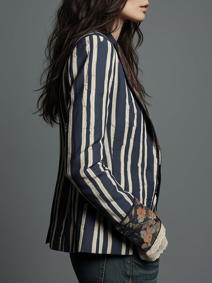 Tailored women's striped blazer, perfect for vintage-inspired layering fashion.