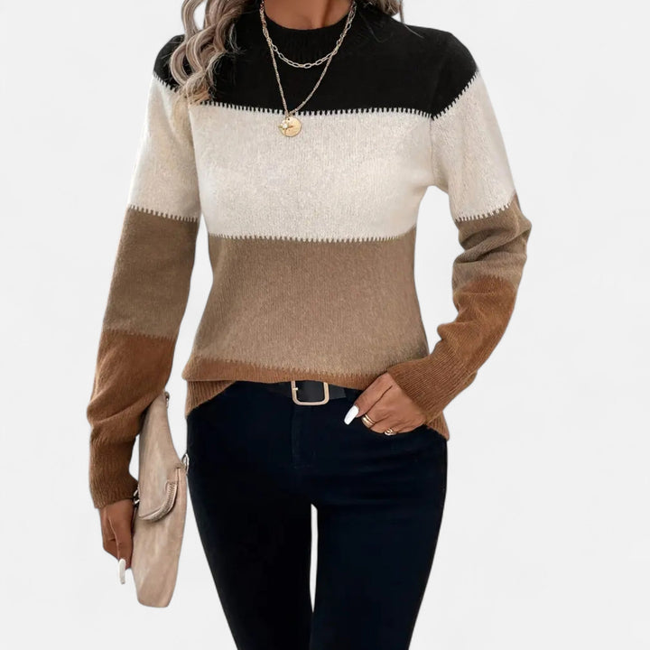 Comfortable women's striped crew neck sweater for fall fashion or elegant spring style.