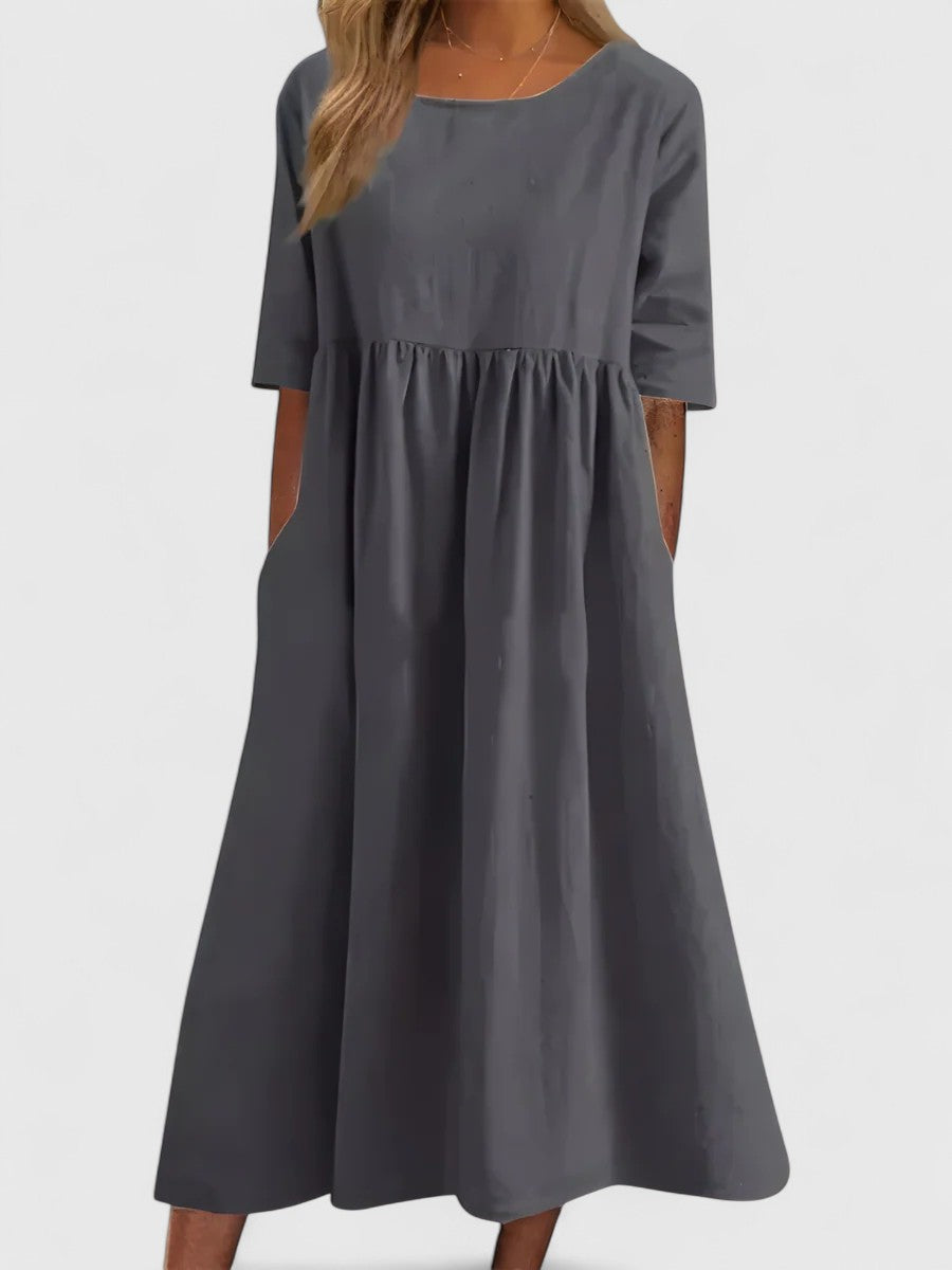 Comfortable & flattering women's casual midi dress, perfect for summer everyday wear. Versatile design.